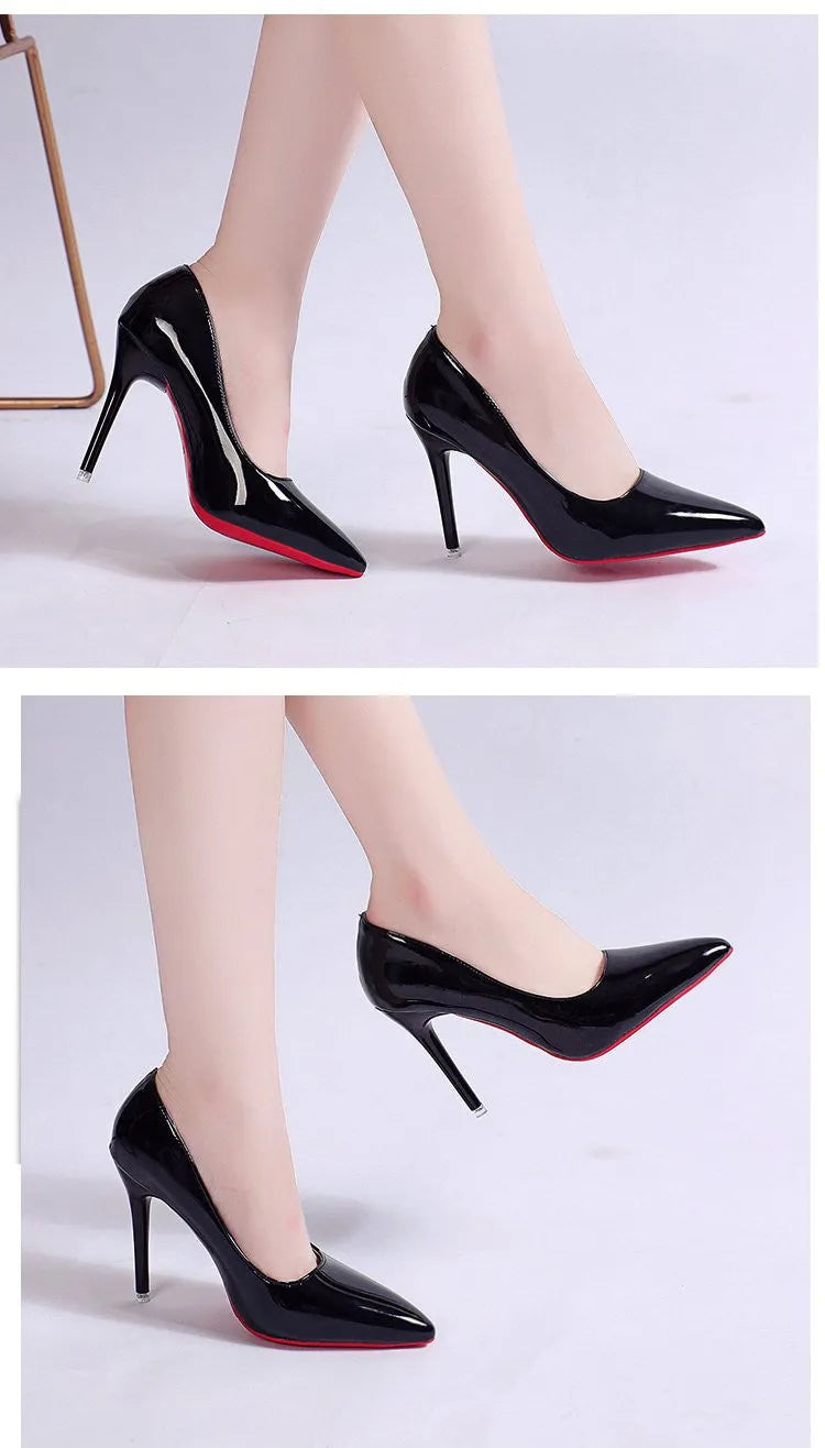 Women's black pointed toe stiletto pump with a shallow mouth design on a rubber sole.