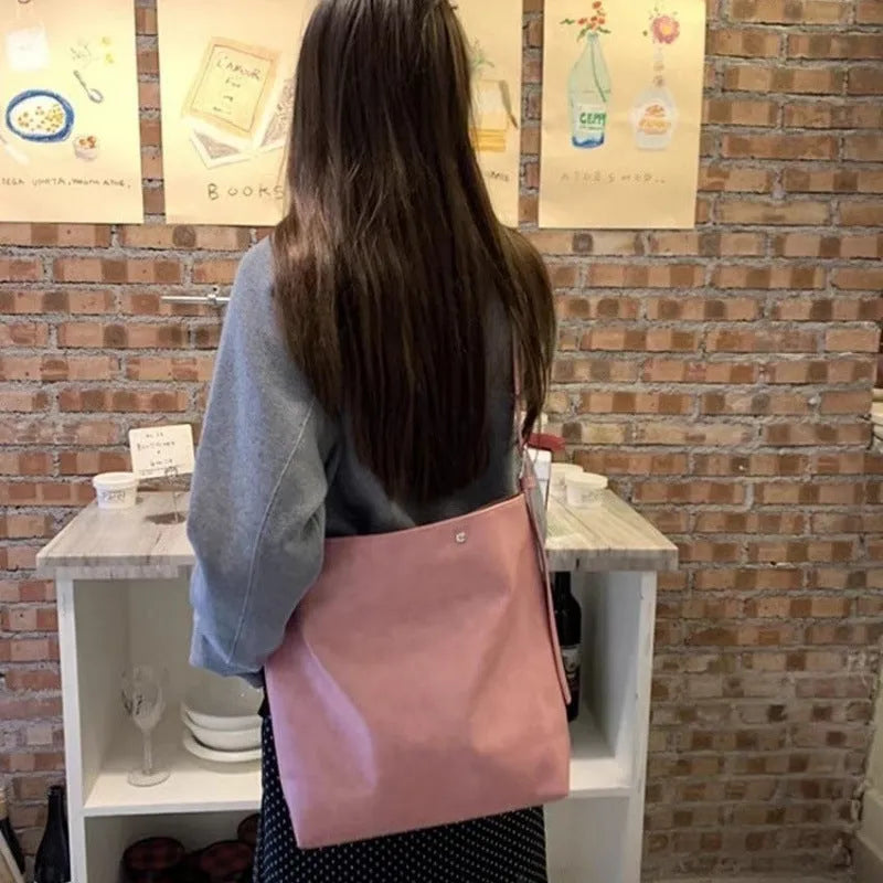 Corduroy one-shoulder commuter bag in pink or brown with PU lining