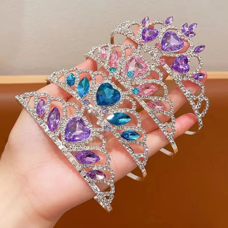 Children's alloy hair band with crystal crown in pink, light blue, or light purple.