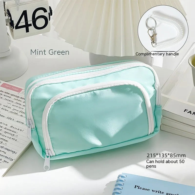 Double layer pencil case in solid colour with gift handle, dimensions 215mm x 135mm x 85mm