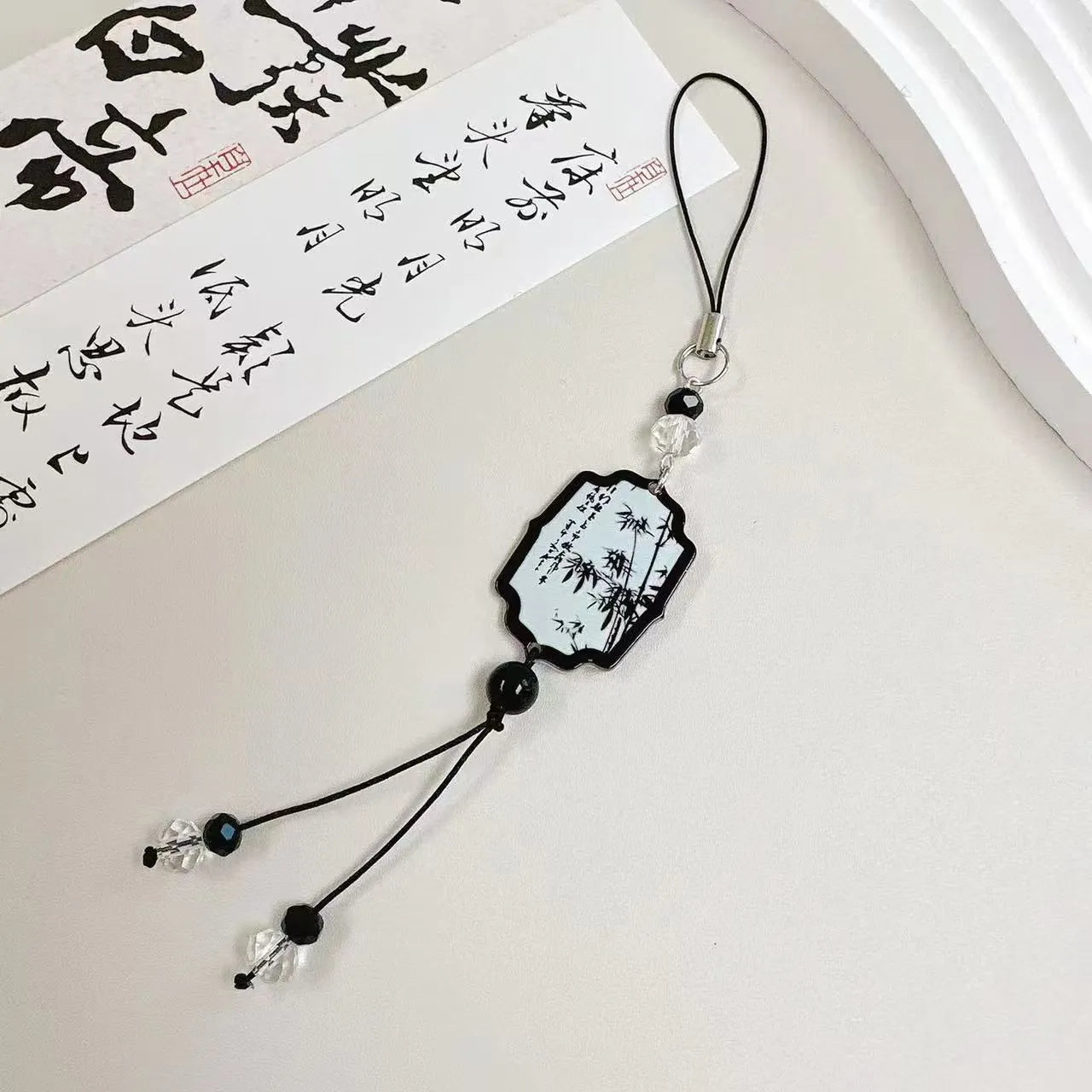 Guofeng style beaded keychain with floral pattern in Fan colour design.
