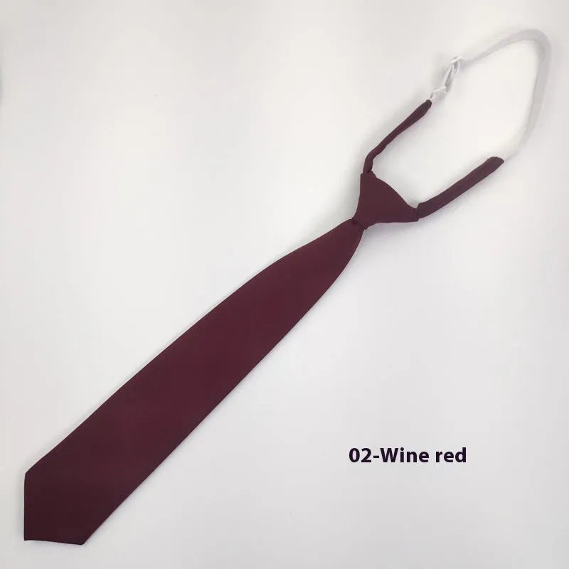 Navy blue cotton bow tie with arrow style shape measuring 35cm by 7cm