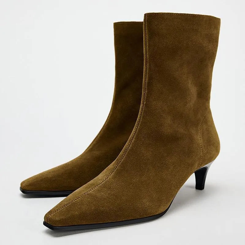 Brown women's square toe ankle boots with a side zipper and a mid-height kitten heel on a waterproof platform.