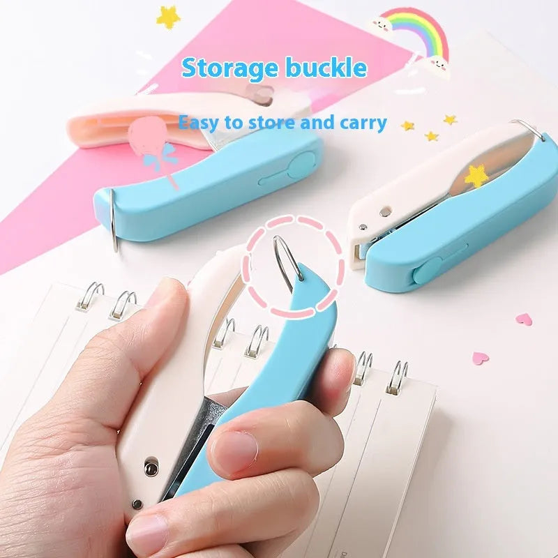 Small manual punching machine with four embossed pattern heads for paper crafts