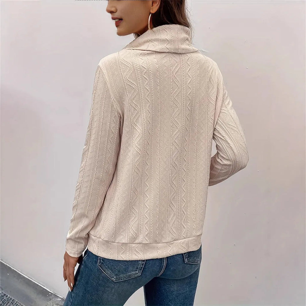 Apricot coloured long sleeve hooded pullover sweater with a drawstring
