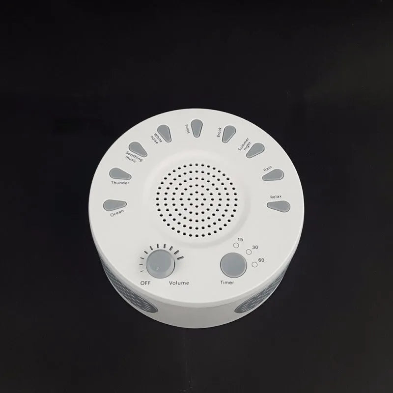 White noise sleep machine with volume knob and timer buttons showing compact portable design