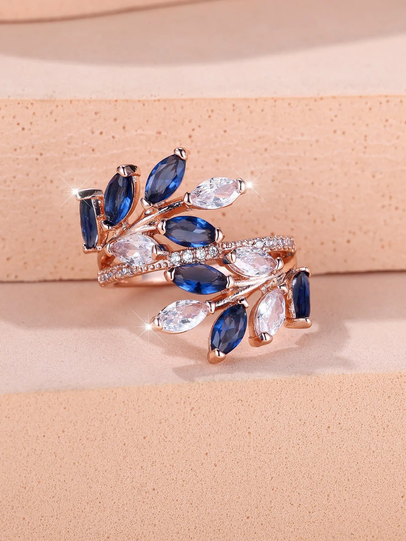 Adjustable copper leaf ring with zircon accents in multiple colour finishes including platinum white and rose gold