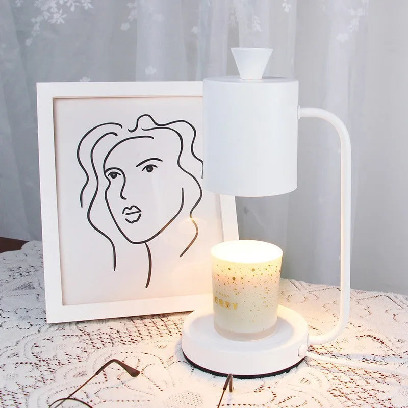 White European-style metal aromatherapy wax melt lamp with a dimmer switch on a table.