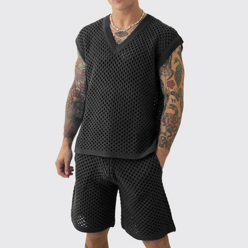 Man wearing a blue V-neck knitted vest and matching shorts from a cotton polyester sports suit set.