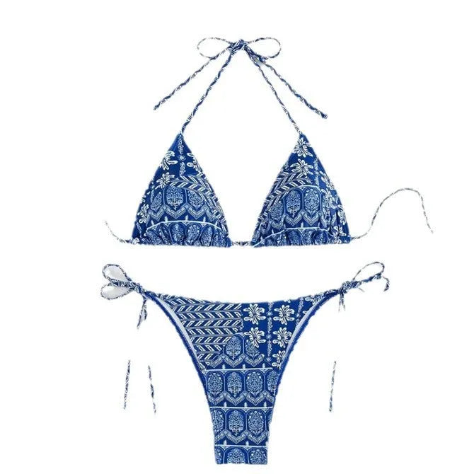 Women's green split bikini bandage swimsuit with printed stitching on a model