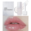 Mint lip essence oil tube in one of five bright colours, shown as a dual-use lip gloss and lipstick.
