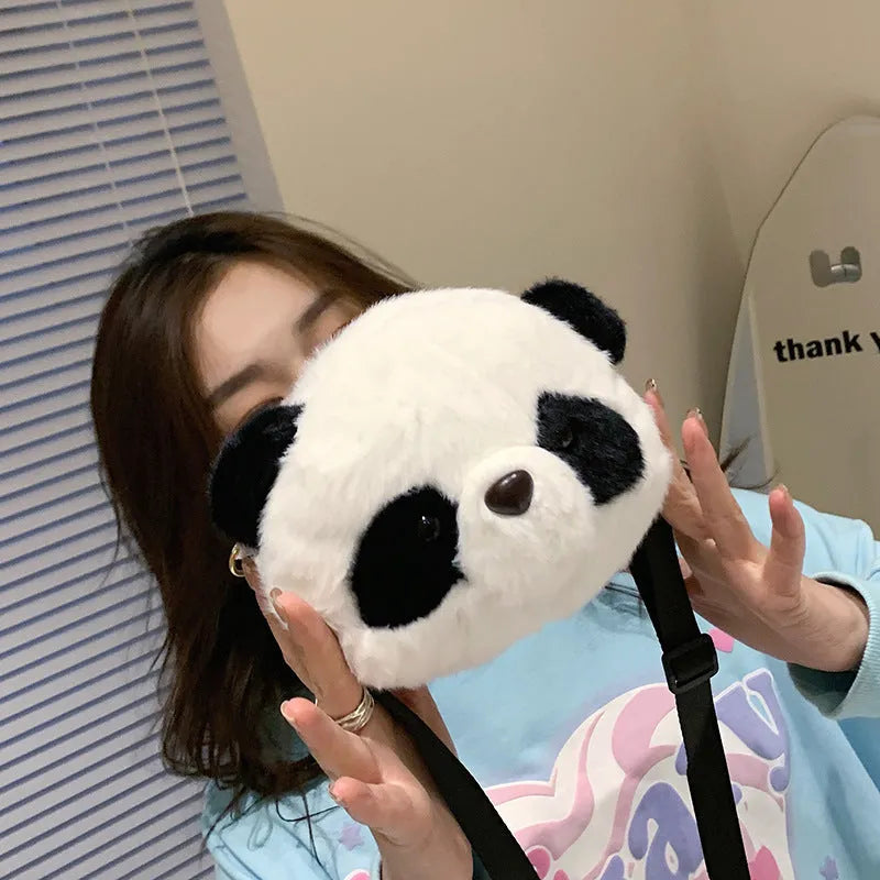 Panda head design plush crossbody bag with cylindrical shape and sandwich pocket