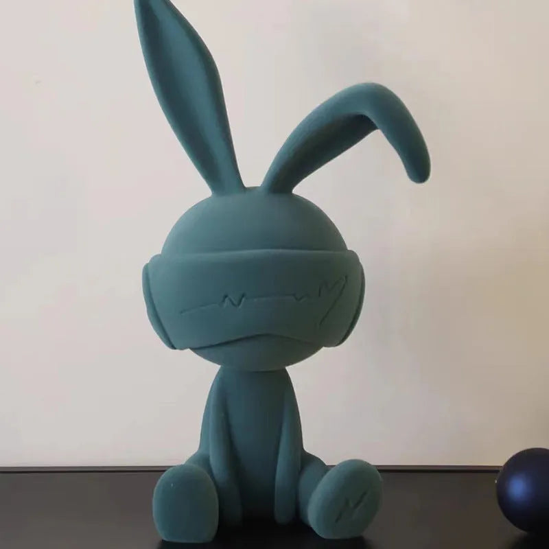 Suede blindfold rabbit resin table ornament in blue, green, or red colour options