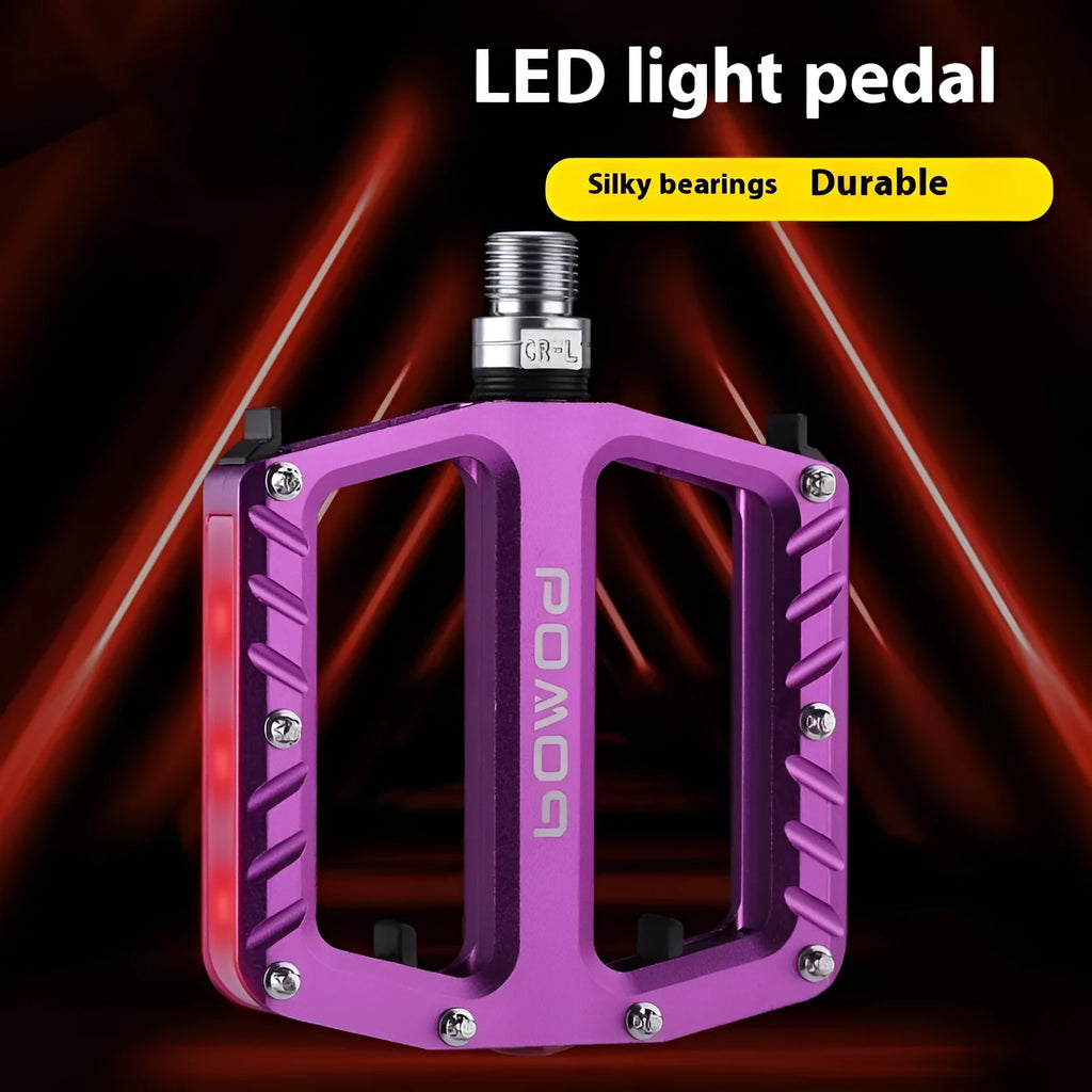Aluminium alloy bicycle pedals with integrated LED illumination in black purple red gold titanium colour options