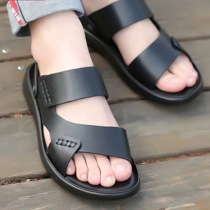 Men's waterproof casual sandals in brown and black with plastic upper, shown on a beach background.