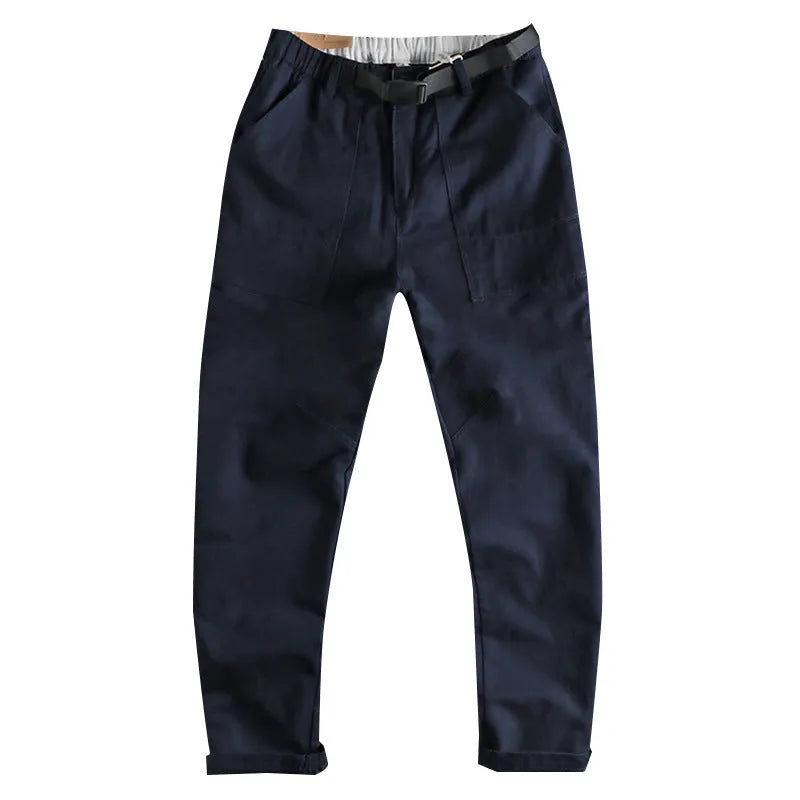 Men's khaki cotton trousers with belt buckle detail on mid waistband