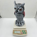 PE plastic artificial owl bird deterrent ornament with shaking head in outdoor garden setting