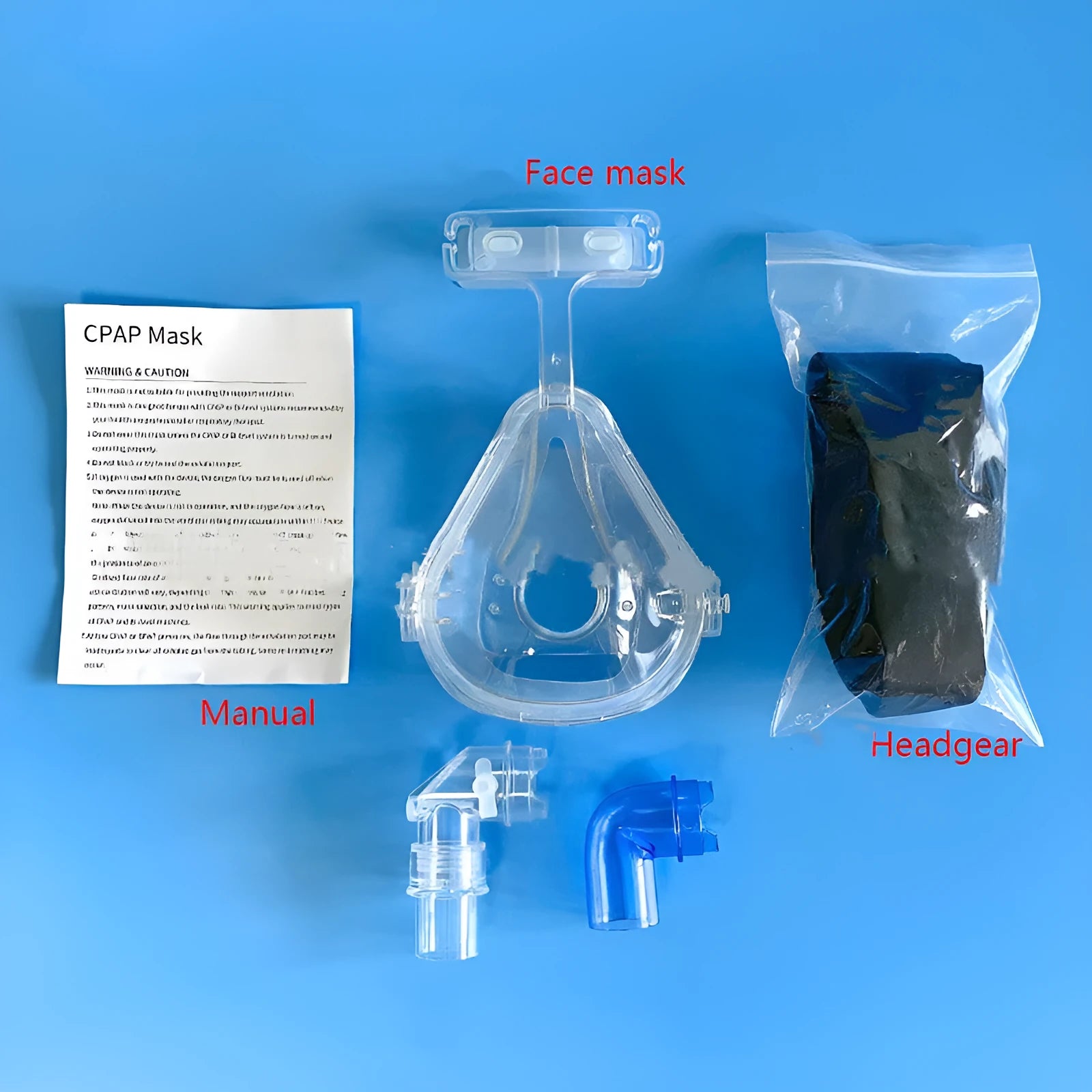 Transparent CPAP breathing mask with silicone construction and rotary elbow adapters for ventilator connection