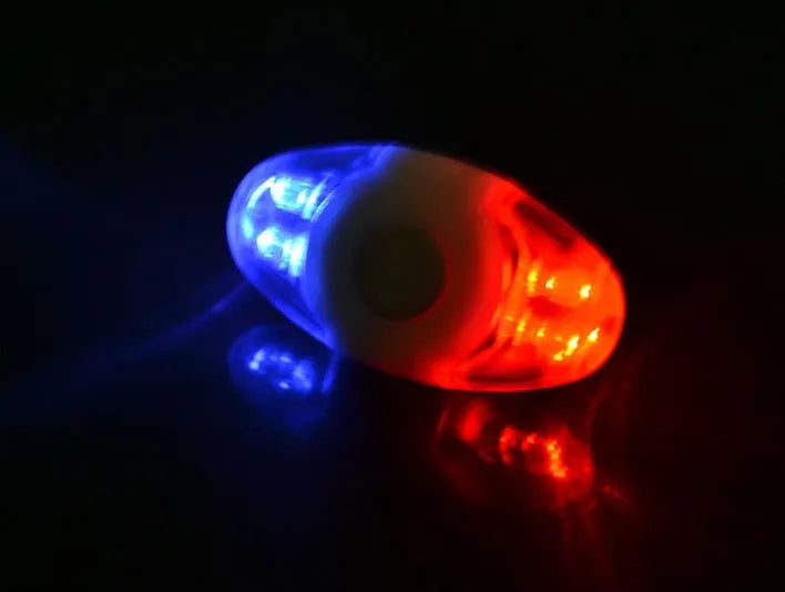 Red and blue LED bicycle tail light with adjustable mounting base