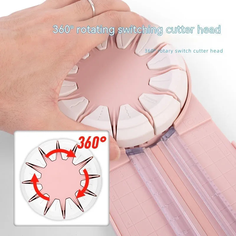 Pink and black plastic paper cutting machine with dotted grid pattern and multiple cutting functions