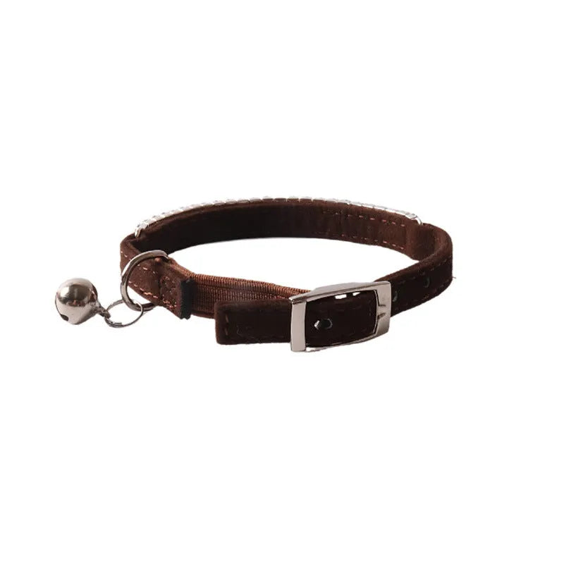 Flocking cat collar with elastic buckle in assorted colours on a white background.