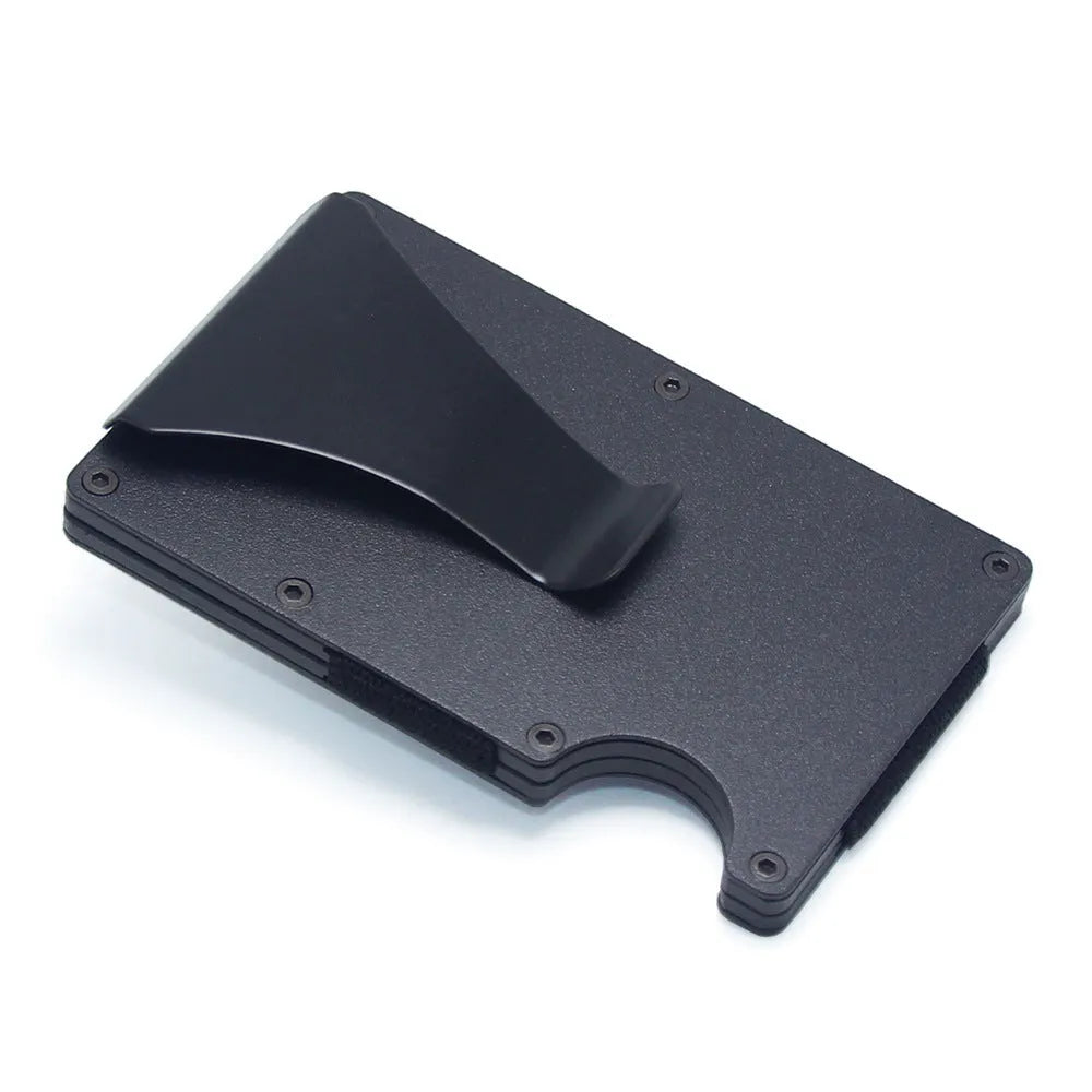 Carbon fibre geometric wallet card holder showing 8mm thickness holding multiple bank cards