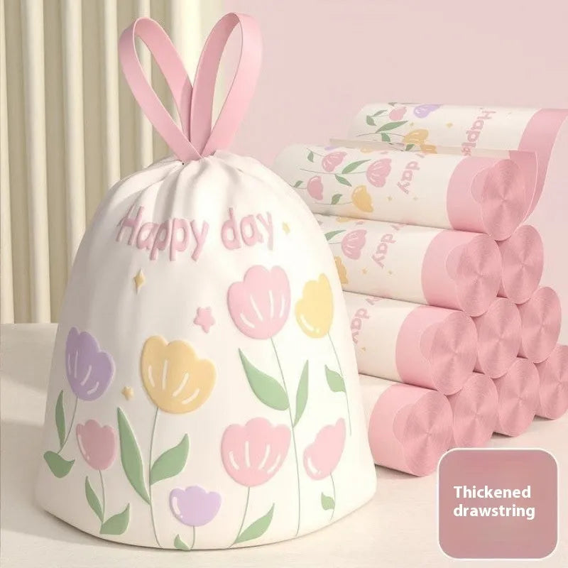Pink degradable argy wormwood mosquito repellent garbage bags with drawstring, size 44cm x 48cm.