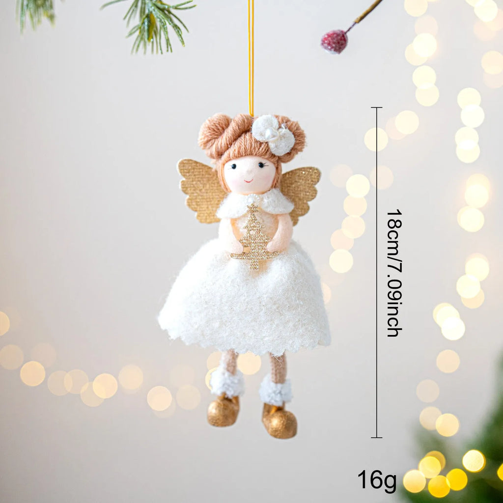 Pink and white cloth angel wings plush Christmas pendant ornament on a branch