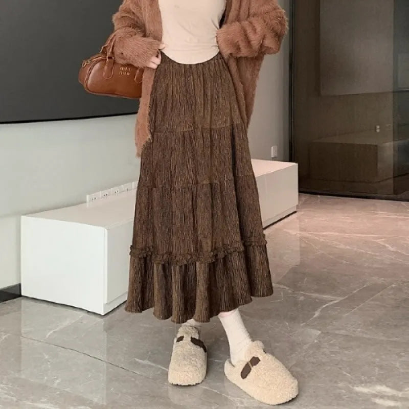 Women's corduroy A-line midi skirt with elastic waistband in beige, black or brown colours