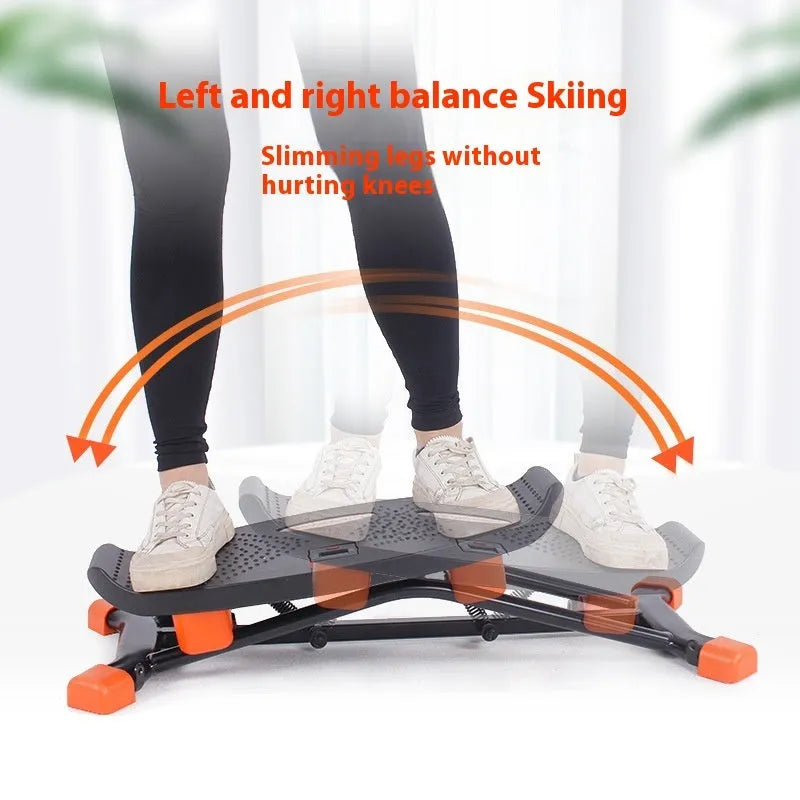 Black mini fitness skiing machine with elastic hand straps for indoor home exercise