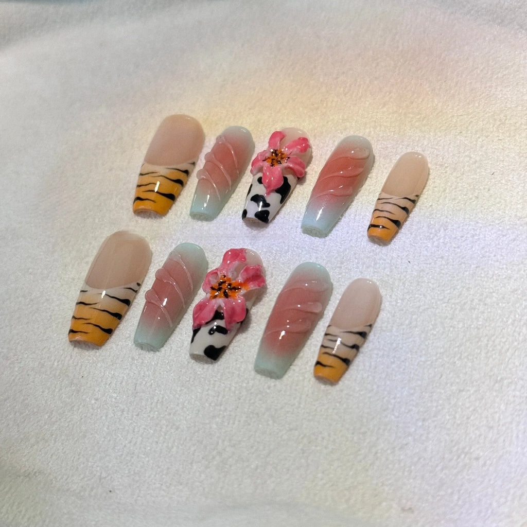 Zebra pattern lily hand carving nail art set showing embossed floral and leopard print designs