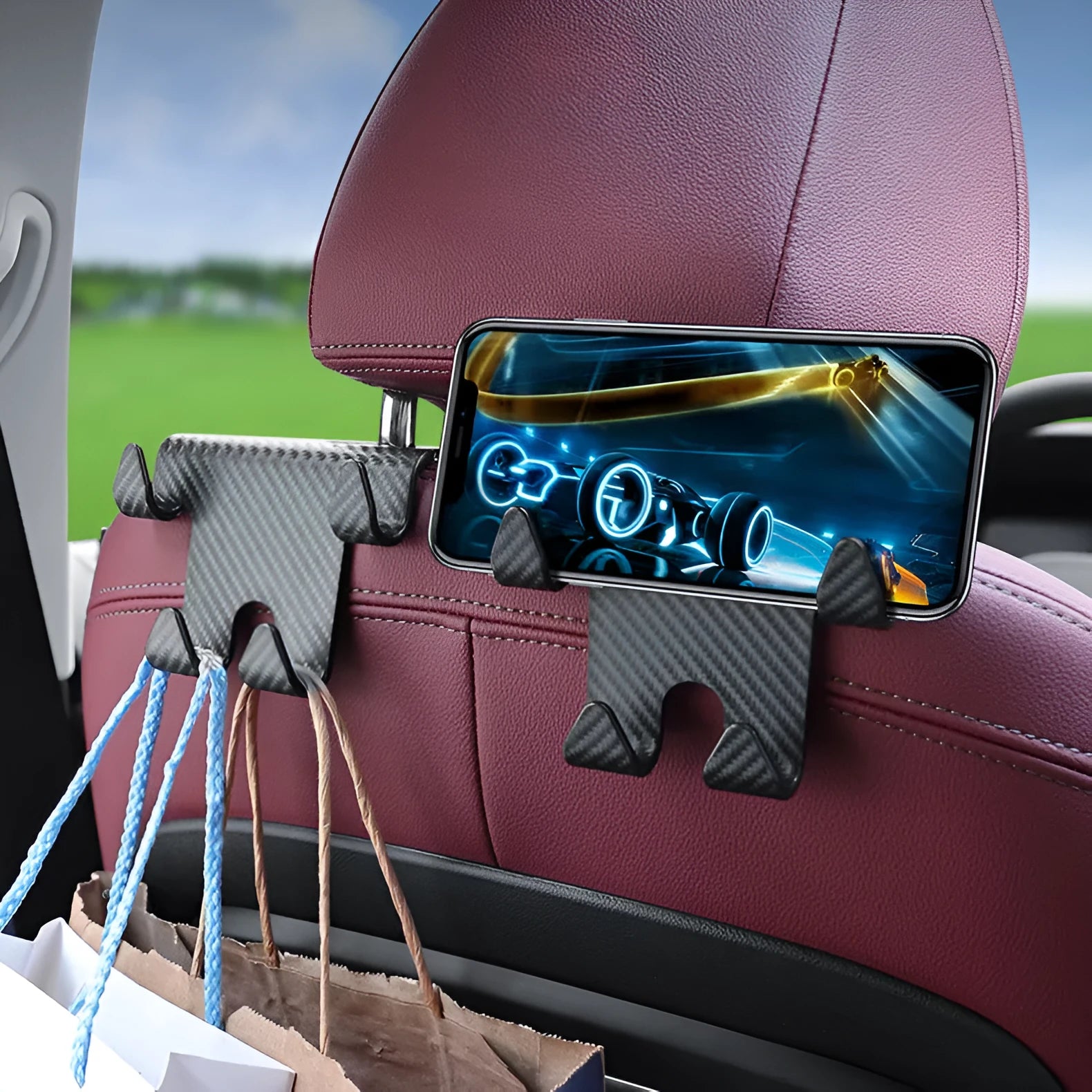 Black ABS plastic car hook with integrated mobile phone holder bracket for rear seat back.