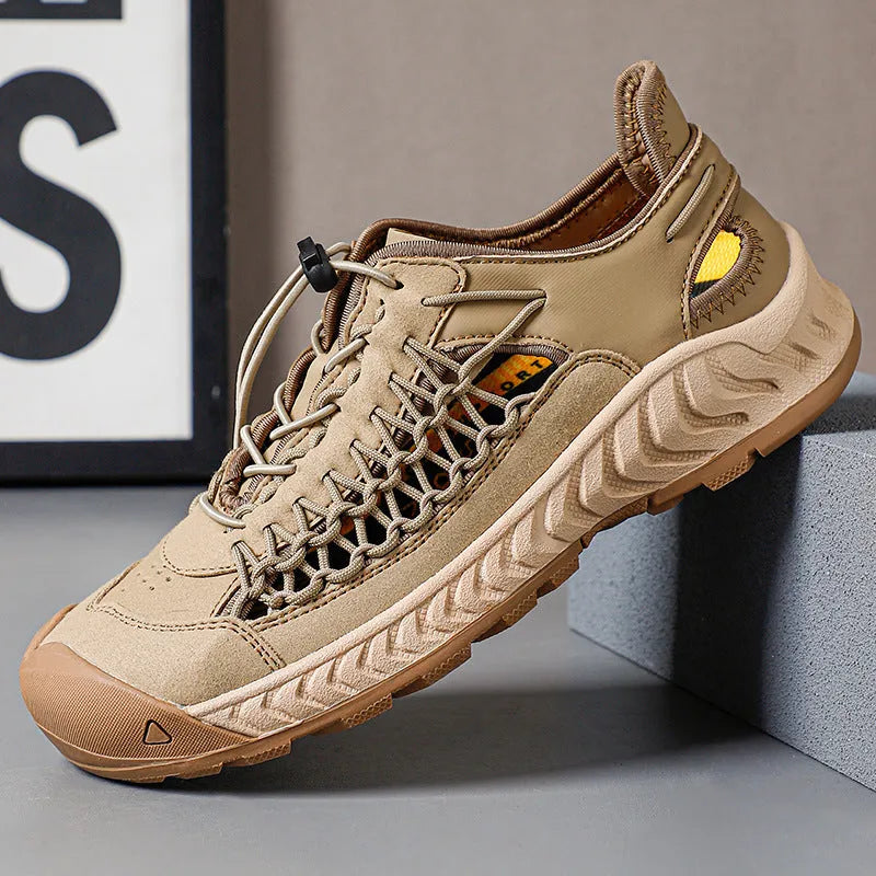 Men's hand-woven casual sandals with a closed toe design in light grey, showing the rubber sole and elastic band.
