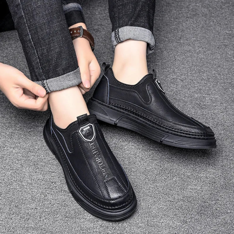 Men's solid colour casual leather shoes with round toe design in black or brown option