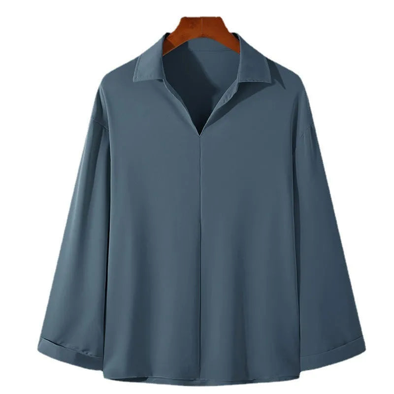 Men's loose lapel casual shirt in polyester blend available in four colours with non-ironing properties
