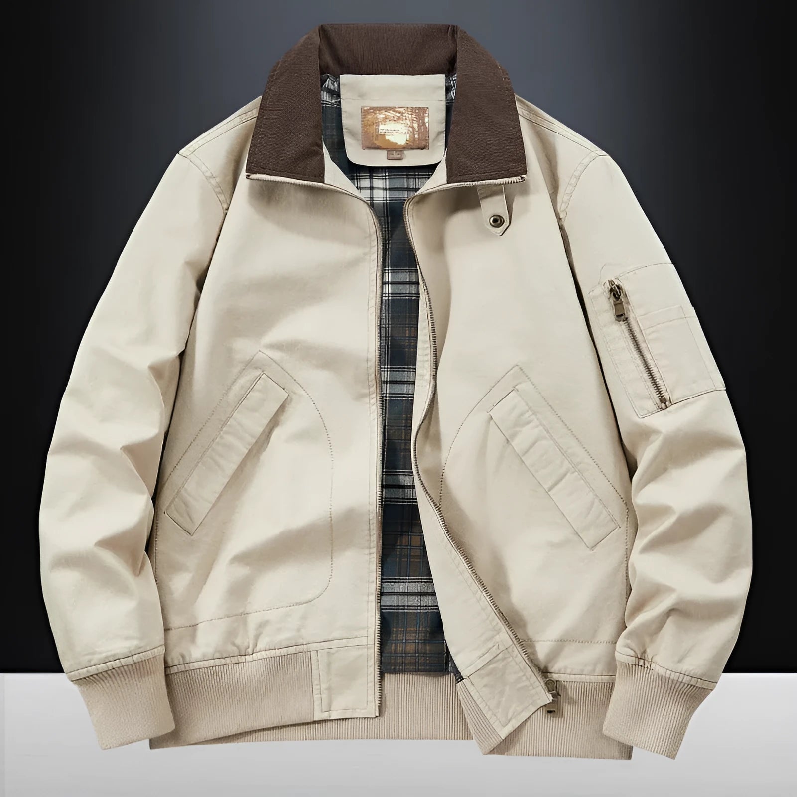 Men's washed cotton baseball-style flight jacket in beige, shown in a casual setting.