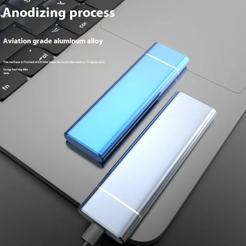 Sapphire blue metal portable solid state external hard drive with USB cable on a white background.
