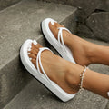 Thick-soled herringbone pattern flip-flops in multiple colours with rubber construction