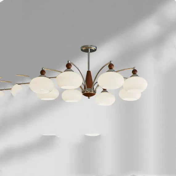 Persimmon glass and chrome chandelier with multiple light heads in Middle Ancient style