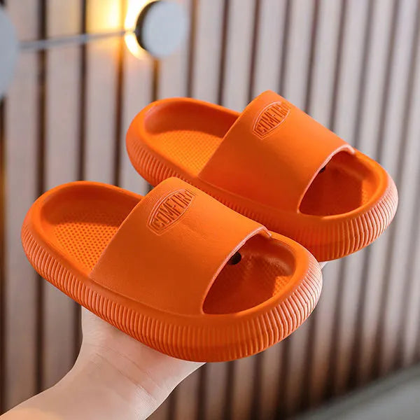 Brightly coloured children's EVA slippers with a textured non-slip sole, shown in multiple colour options.