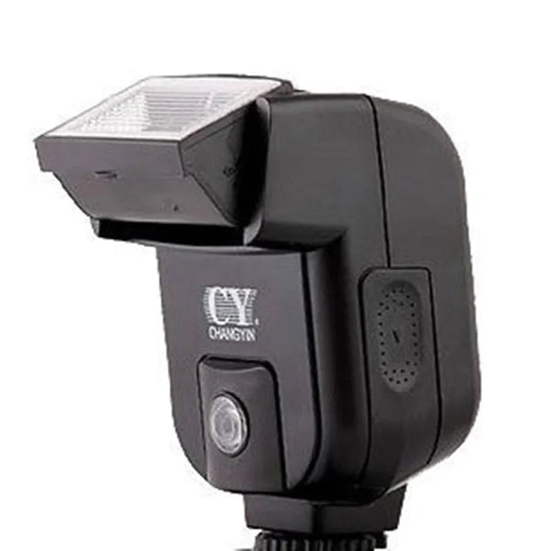 Compact black camera flash unit with tilt head showing GN20 specification and 5600K colour temperature label