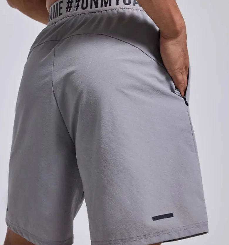 Men's loose sport shorts with elastic fly opening in black, blue or grey colours