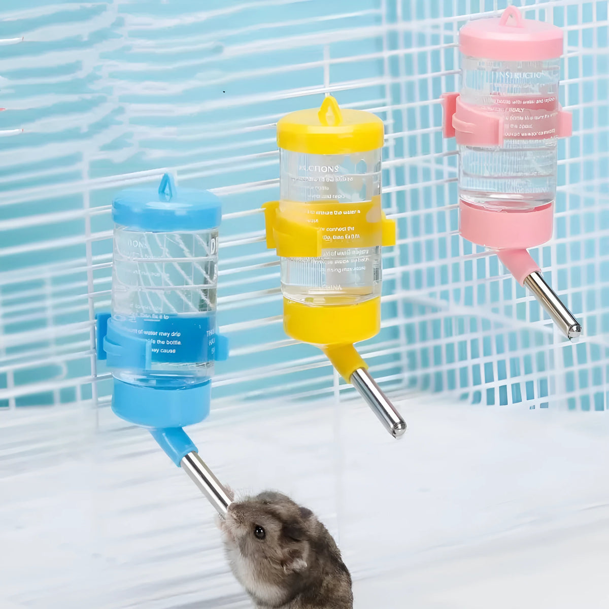 Plastic ball kettle pet water feeder in assorted colours with leak-proof design for small animals.
