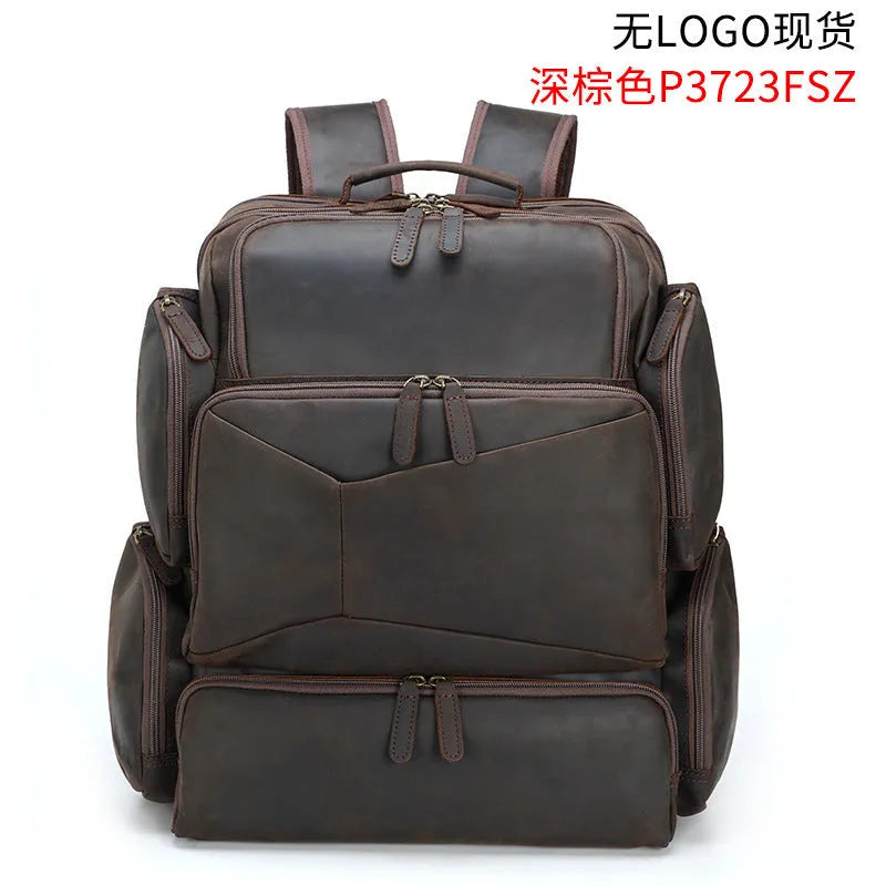 Dark brown genuine leather backpack with 17-inch laptop compartment and multiple organisational pockets