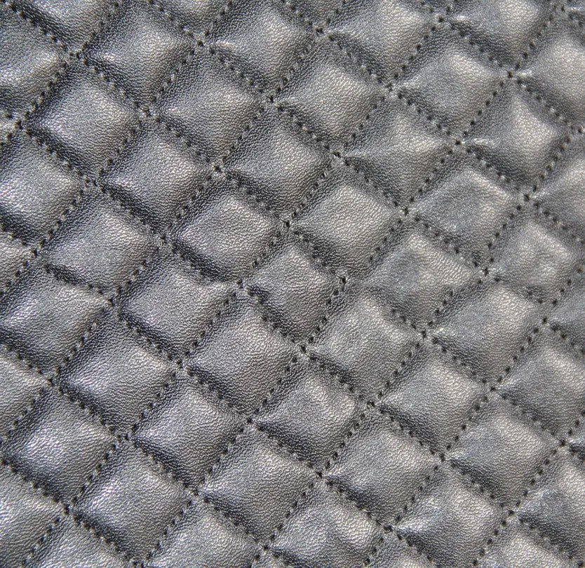 Black quilted car seat cover made from PU and polyester fabric with plastic installation hooks.