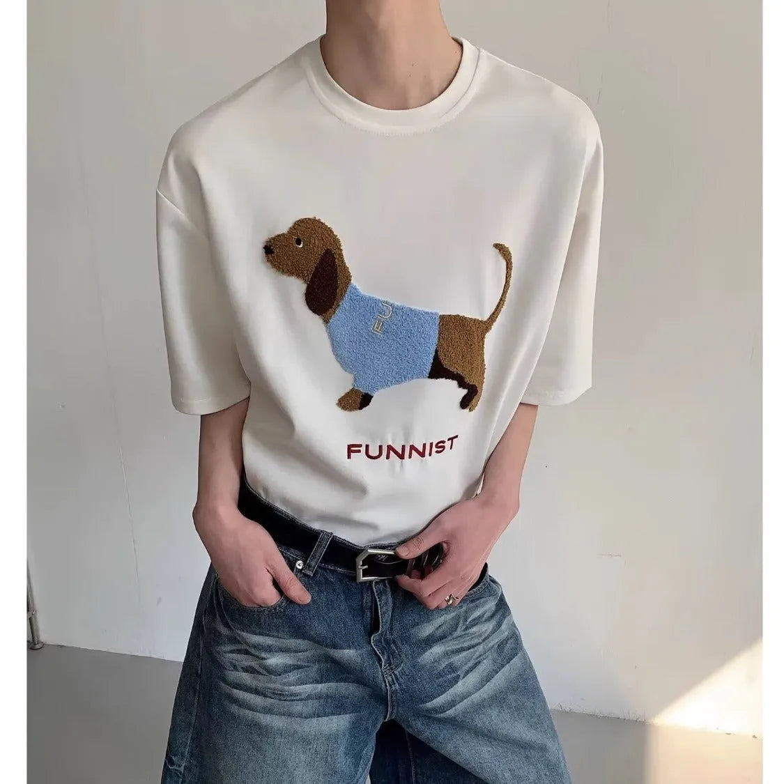 Grey men's t-shirt with an embroidered sausage dog design on the chest