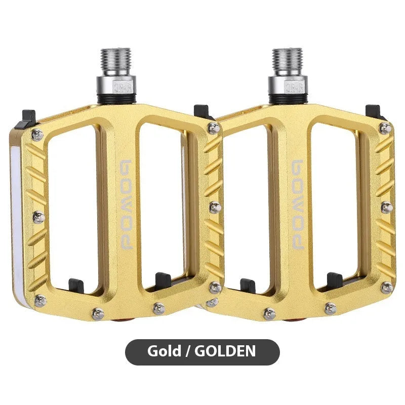 Aluminium alloy bicycle pedals with integrated LED illumination in black purple red gold titanium colour options