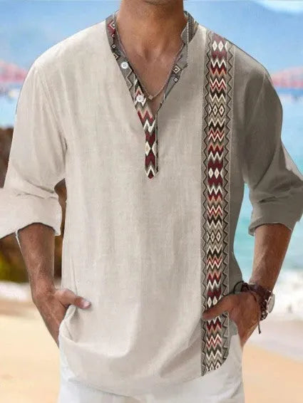 A person wearing a thin, striped long sleeve Hawaiian shirt in a digital bamboo linen style.