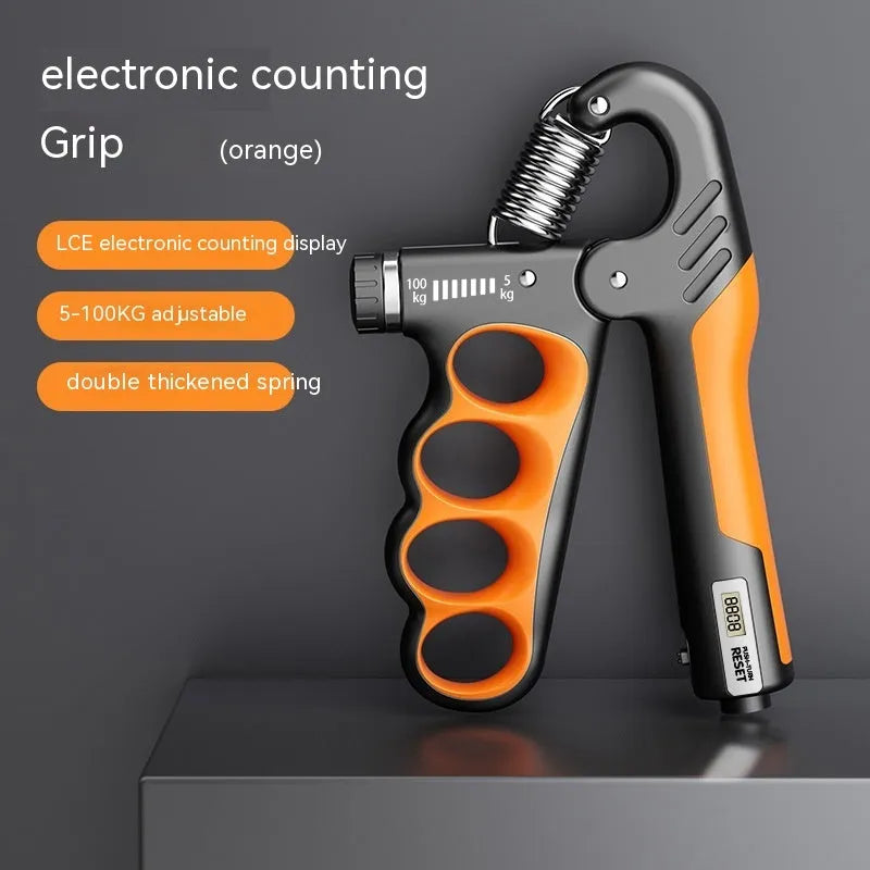 Grey electronic counter spring grip held in a hand showing the digital display.