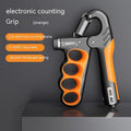 Grey electronic counter spring grip held in a hand showing the digital display.